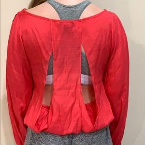 Bebe blouse with cut out back and slit sleeves